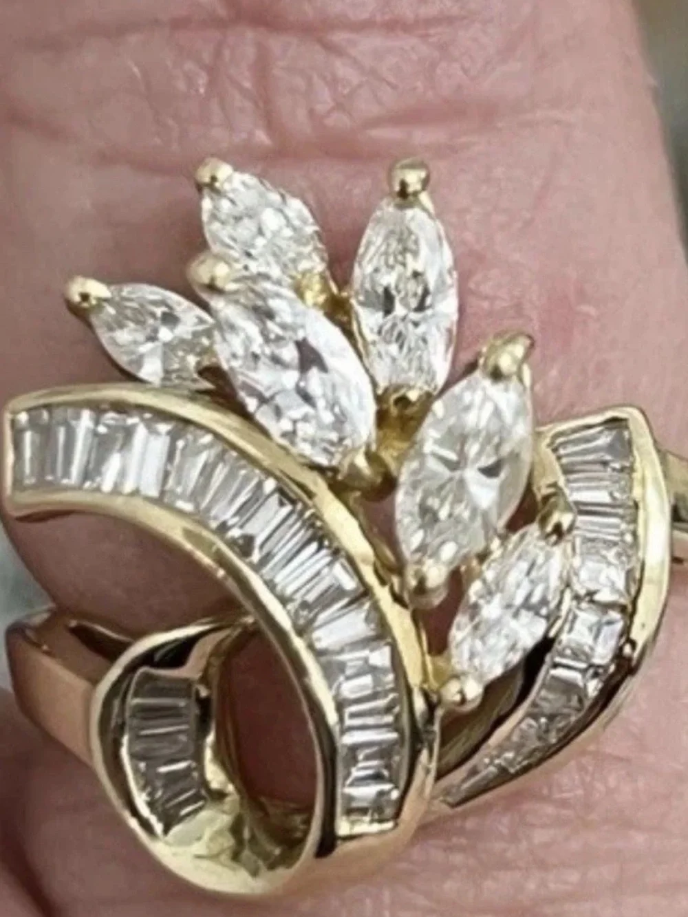 Solid 18 karat gold diamond cluster ring.